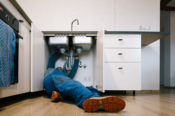 Professional Emergency Plumber technician working in Rubicon, WI